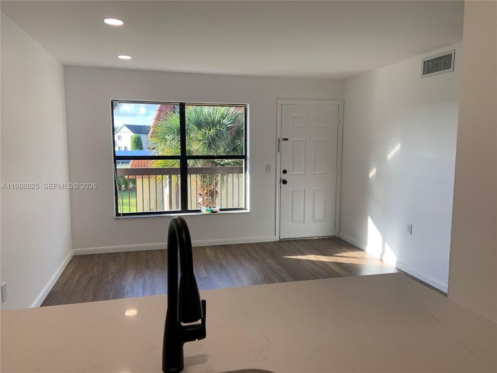 Photo of 10016 NW 4th St #201, Pembroke Pines, FL 33024 (MLS # A11988625)