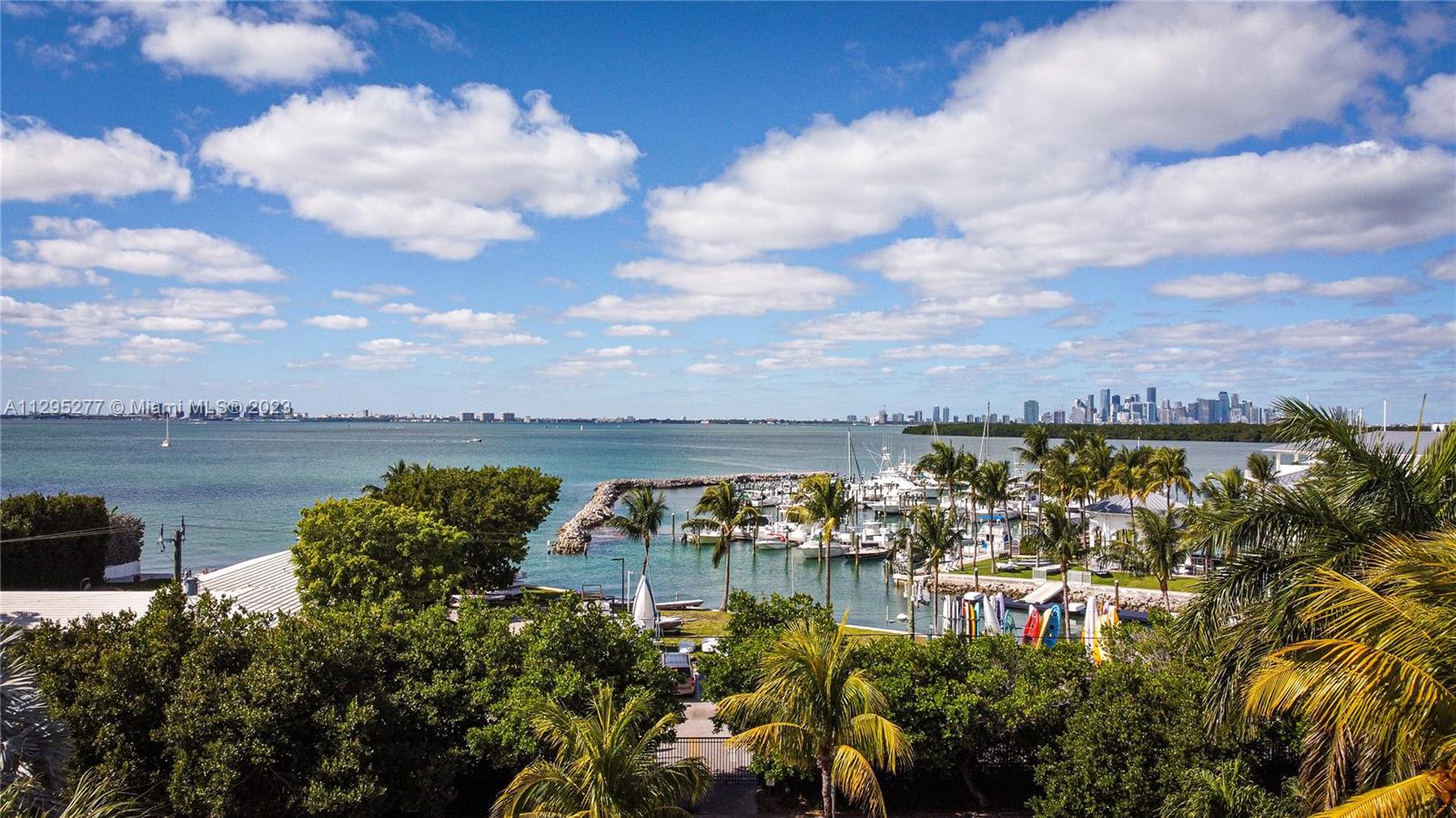 Located on exclusive & prestigious Harbor Dr. 1 of only 8 properties located directly facing Key Biscayne Yacht Club.
Enjoy some partial ocean views from the balcony, living and dining area. Fully renovated: floors, baths, kitchen, brand new high impact doors & windows. 10 ft elevated.
UL: High ceilings, spacious and ideal Living & Dining Area with spectacular views to KBYC. 1/2 bath. Master bedroom with walk in closet, bathroom with double sinks, shower & bathtub. Luminous kitchen with lots of storage space & dine in area. 5th Bed/Office.
LL: 3 spacious & bright bedrooms. 3 renovated full bathrooms. Laundry room with direct access. Family room with access to the pool & barbeque area.
Exterior: Covered terrace. With barbeque. Integrated pool & barbeque area on the same level.