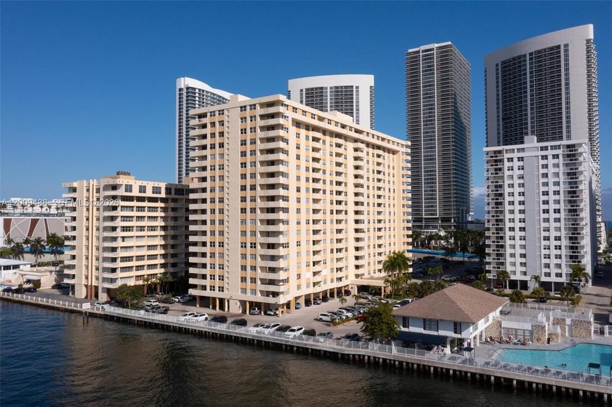 Enjoy wide Intracoastal views from this south-facing residence in a prime Hallandale Beach location, just a short walk to the ocean. This spacious, light-filled condo offers a practical split-bedroom layout, tile flooring throughout, a generous walk-in closet, and excellent storage space.

The community is secure and well-maintained, featuring gated electronic access, 24-hour security patrol, a heated pool overlooking the Intracoastal, fitness center, sauna, and billiards room. Monthly maintenance includes water, cable, and internet.

Conveniently located near Gulfstream Park, shopping, dining, entertainment, and the beach, this property is a great option for anyone looking to enjoy easy South Florida living.