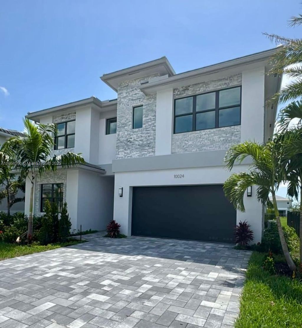 Photo of 10024 Stockrun Dr, Palm Beach Gardens, FL 33412 (MLS # A11858100)