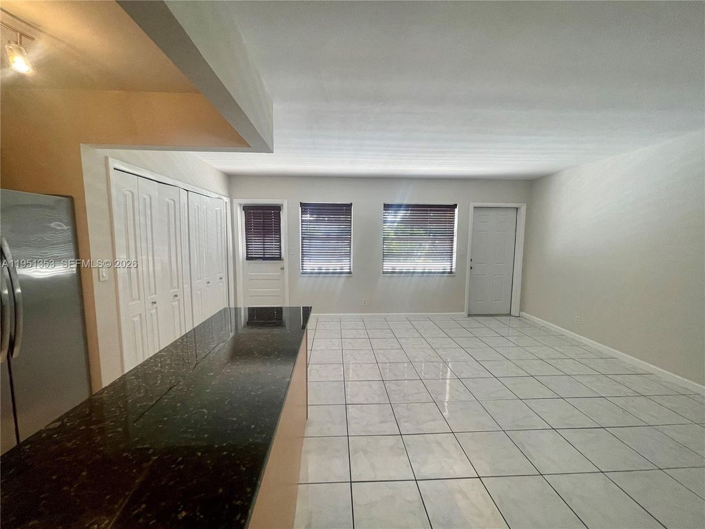 Photo of 4050 NE 12th Ter #25-1, Oakland Park, FL 33334 (MLS # A11951353)