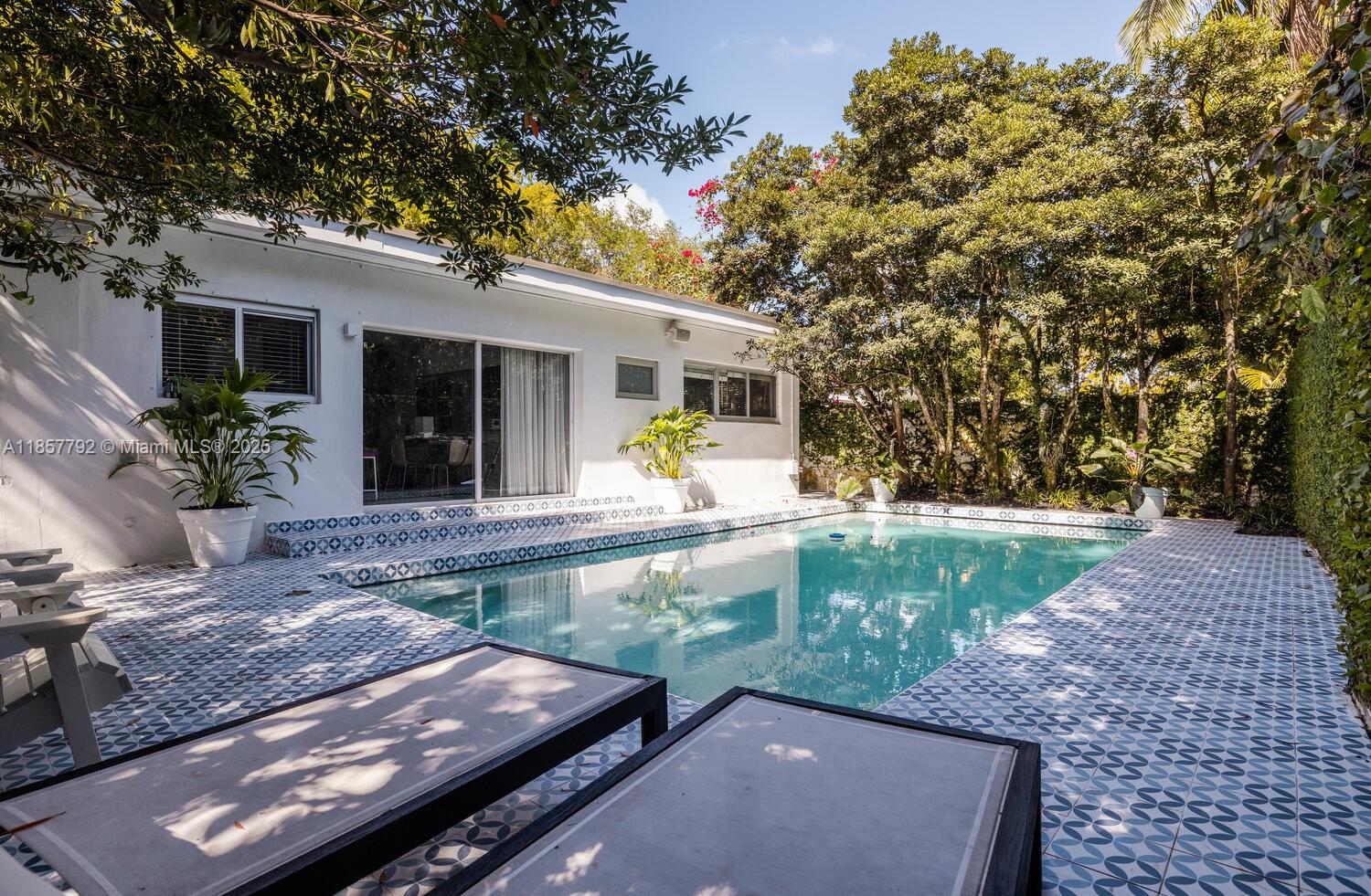 Welcome to Artist Den, your dream furnished rental home in Miami. This bright, open floor plan is perfect for gathering, while the spacious private yard and pool provide the ideal outdoor retreat. Whether you’re grilling, lounging with loved ones, or heading out for a beach day, this home has everything you need for the perfect escape. Offered as a fully furnished rental, available for a minimum stay of one month.
