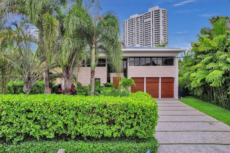 Beautiful and spacious waterfront contemporary-style house in the vicinity of Golden Beach and Gulfstream Park. Dock your 60' yacht for unrestricted navigating to the ocean through Haulover Inlet or Stranahan River, or use a jet-ski lift for local water activity. Pool with jacuzzi, theatre with hi-end sound system, smart-home system, efficient lights, marble and precious floors, propane tank and grill, elevator, 3 cars garage, and many other nice little things. Golden Isles Community Park offers easy access to outdoor tennis, basketball, pickleball, and bocce courts. The park provides access to the playground, dog parks, picnic areas with a pavilion, and a walking track. Finally, of course, the amazing Atlantic Ocean with South City Beach Park: 8 min driving/15 min biking/45 min walking.