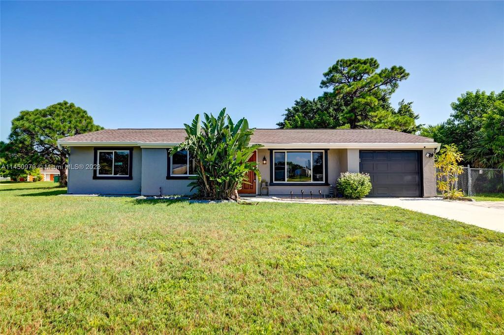 Photo of 245 SW Kentwood Rd, Port Saint Lucie, FL 34953 (MLS # A11450979)