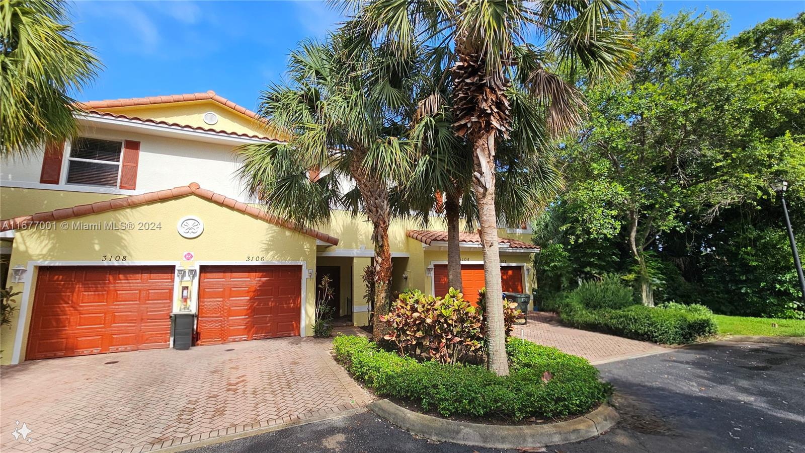 Motivated sellers: Welcome to this beautiful 3 bedrooms, 2.5 bath townhouse! Conveniently located near airports and major highways. This home boasts an updated kitchen with modern stainless steel appliances and granite counter tops, beautiful tile flooring and wood flooring upstairs. Impact windows and doors. The washer and dryer are located on the second floor. Perfect for commuters and first time home buyers. This property combines comfort and convenience in a prime location. All financing are welcome.