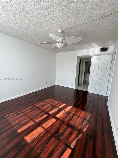 Photo of 9330 Lagoon Pl #201, Davie, FL 33324 (MLS # A11944400)