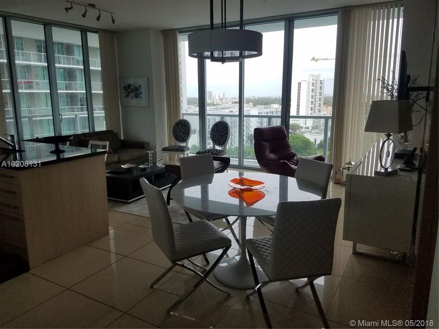 Very nicely furnished 2 bedroom condo with tiled floor.  Great garden and pool views.  Full amenity building in the heart Brickell.  Mary Brickell village is steps away.  People mover and metro rail located across the street.  Best location.