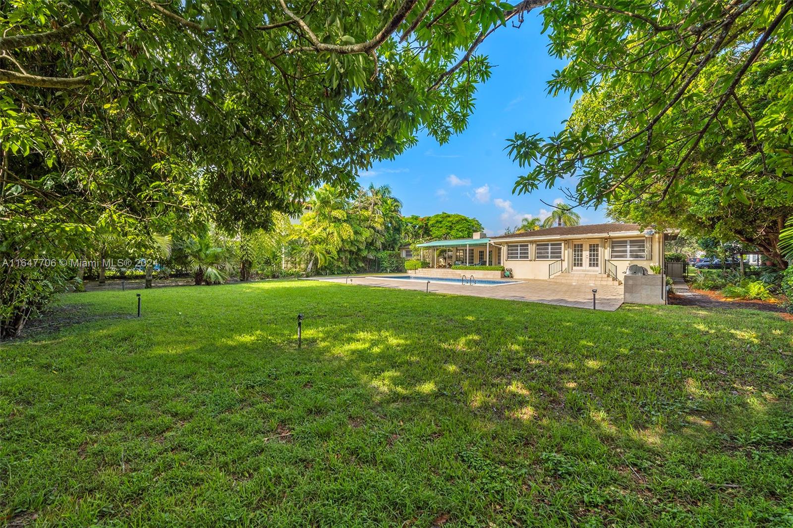 Nestled on a 22,500 sq ft lot in one of Coral Gables' most coveted neighborhoods, this 3-bedroom, 3-bathroom home offers 2,827 sq ft of living space and a unique opportunity to create your dream estate. The property features spacious entertaining areas, a large terrace, a sparkling pool, and an expansive yard, ideal for outdoor gatherings or relaxation. Ideally located near the Biltmore Hotel, golf course, Little Flower Catholic Church, and top-rated schools, with a 2-car garage for added convenience, this property is practical and full of potential—a chance to own a slice of Coral Gables living.