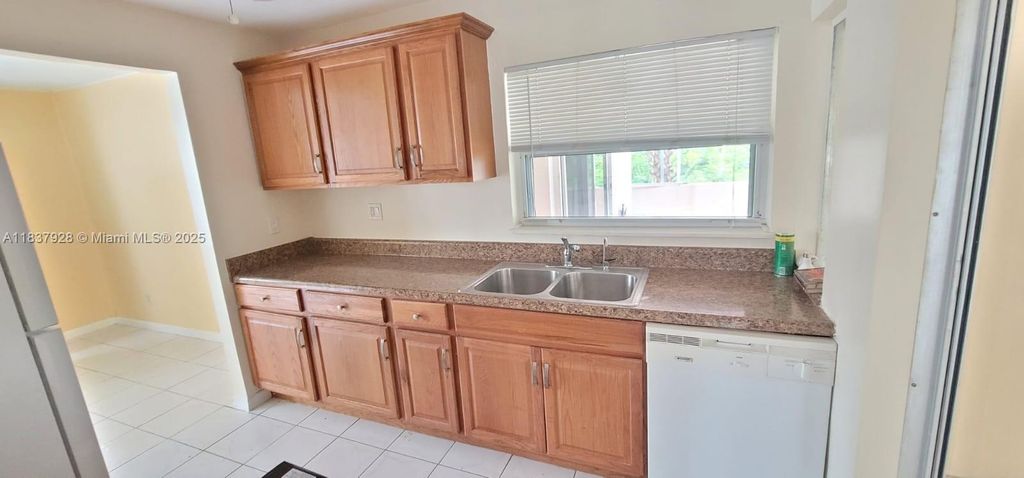 Photo of 4373 NW 45th Ave #0, Lauderdale Lakes, FL 33319 (MLS # A11837928)