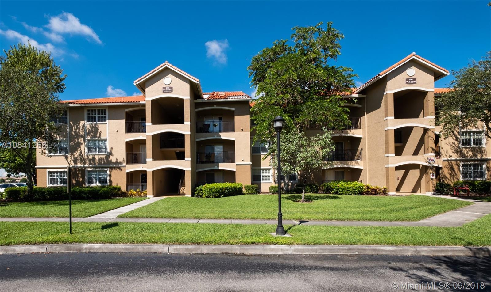 Spotless One Bedroom Condo at The Marquesa. Enjoy a beautiful gated community. Luxury style living Club House offers 24hr GYM, Indoor Racquetball court, and pool. The unit was just painted and new vinyl floors installed. It features a large bedroom with a huge walk-in closet. Great lake view from living and bedroom. Washer and Dryer in unit. Assigned Parking spot, Association approval is Required. Easy to Show. Fast Owner Approval.