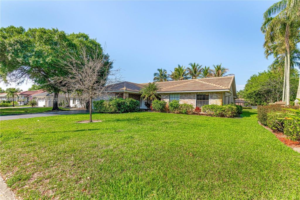 Photo of 280 NW 121st Ter, Coral Springs, FL 33071 (MLS # A11993958)