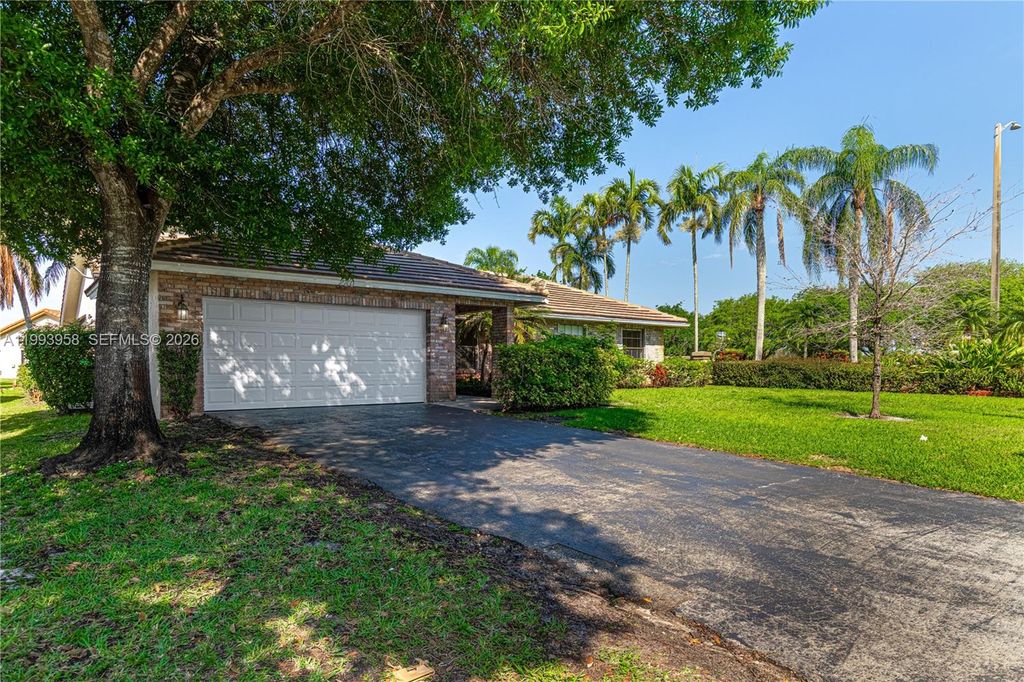 Photo of 280 NW 121st Ter, Coral Springs, FL 33071 (MLS # A11993958)