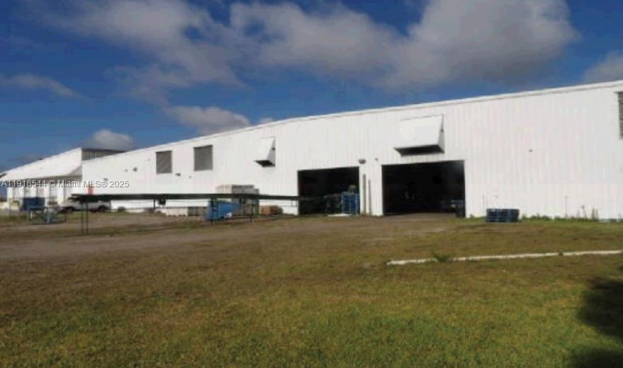We are delighted to present a 33.14 Acre Packing and Shipping Facility designed and used for fresh produce. There are 3 folios of Land, Flood Zone X. The Commercial Warehouse is 154,950 SF with concrete and steel construction, metal roof and metal siding. The interior has over 25' ceiling height and has 2,000 SF of covered/enclosed maintenance area; 6,000 SF covered work area; 18,000 SF of degreening rooms (now utilized for storage); 103,750 SF of packing line and box making area; floor offices and employee break rooms. A portion of the interior is dock height for delivery of products.  21,600 SF is enclosed for walk in/drive in coolers. The 3,600 SF professional office building is concrete block construction. Other improvements on site include an 800 SF Metal Pole Barn, a 784 SF mobile home (2001) and retention pond. The entire campus is fully fenced and there are 3 gated entries. Electric is provided by FPL. Telephone is provided by Embarq. Water and sewage disposal are provided by onsite well and septic systems. This Agricultural Facility is located within Hendry Co, Fl on Hwy 80 within the southwest Florida region.  Site is approximately 22 miles east of Ft Myers, 50 miles west of West Palm Beach, 50 miles northwest of Fort Lauderdale, 122 miles Southeast of Tampa and 98 miles northwest of Miami.  In this region of Florida, the primary mode of transportation of goods is via truck.  This area is serviced by most major carriers and freight lines.
