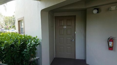 Photo of 550 SW 137th Ave #101L, Pembroke Pines, FL 33027 (MLS # A12016411)
