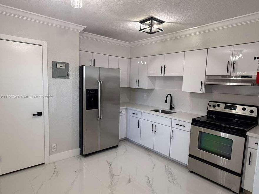 Come see this beautifully upgraded 2-bedroom, 1-bath apartment, conveniently located near all the shopping and dining on Davie Blvd. Inside, you’ll enjoy a brand-new kitchen and bathroom, new tiled floors, fresh paint throughout, and stainless-steel appliances. The unit also features an on-site coin-operated washer and dryer plus a spacious backyard perfect for entertaining.

For added peace of mind, the property offers private, secured entry and assigned parking for up to two vehicles. Ideal for a single individual or a working couple looking for style, comfort, and convenience.