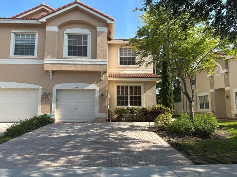 Photo of 12464 SW 42nd St, Miramar, FL 33027 (MLS # A11808226)