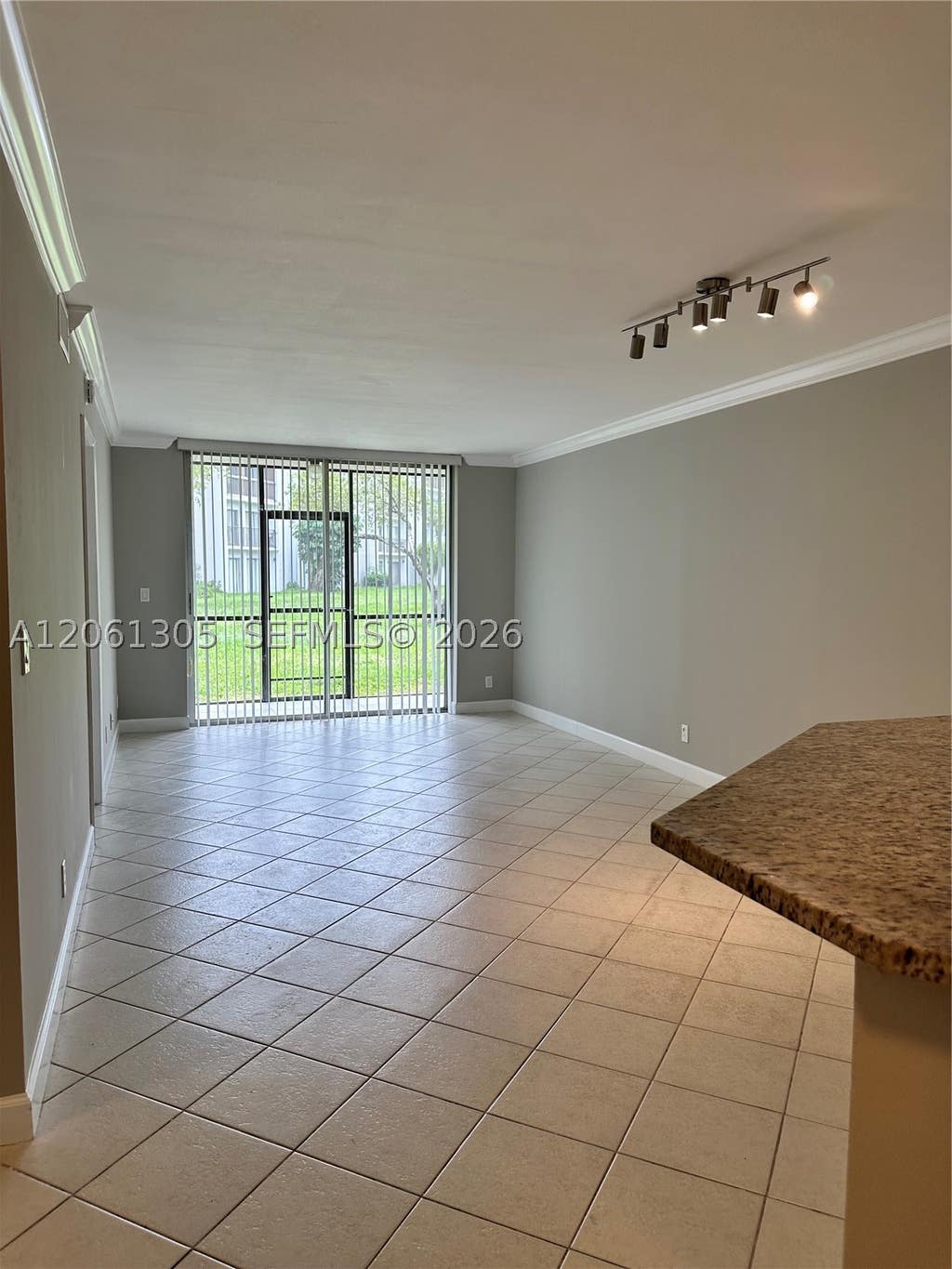 Photo of 8750 N Sherman Cir #103, Miramar, FL 33025 (MLS # A12061305)