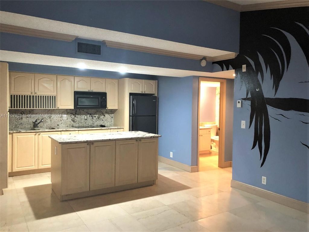 Photo of 4055 W Mcnab Rd #H310, Pompano Beach, FL 33069 (MLS # A11707523)