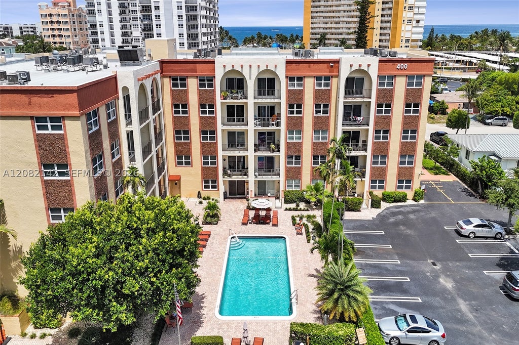 Photo of 400 N Riverside Dr #406, Pompano Beach, FL 33062 (MLS # A12082142)
