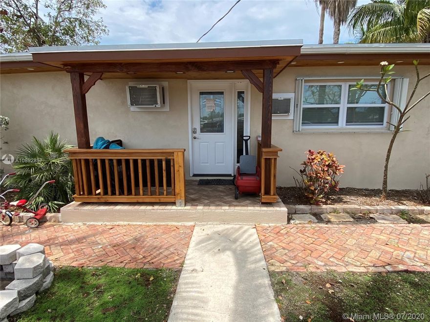 Great Family home newly renovated and updated with custom tile baths, updated porcelain wood plank flooring, wood cabinets, stone counter tops, new stucco ext finish, custom wood fencing, two off street parking spaces.