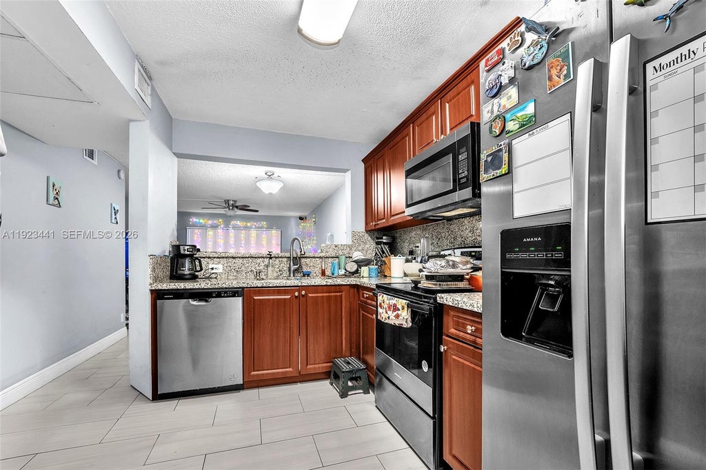 Photo of 9000 NW 28th Dr #1-207, Coral Springs, FL 33065 (MLS # A11923441)