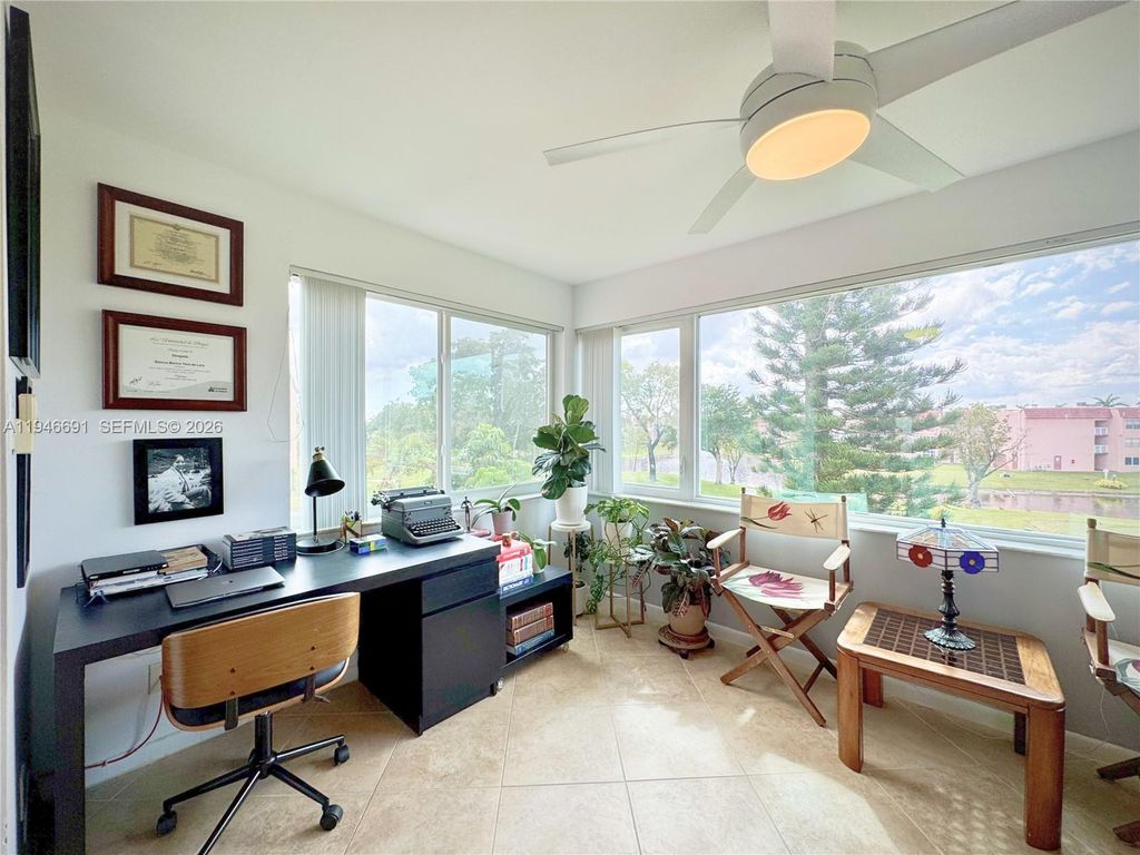 Photo of 9501 Sunrise Lakes Blvd #306, Sunrise, FL 33322 (MLS # A11946691)