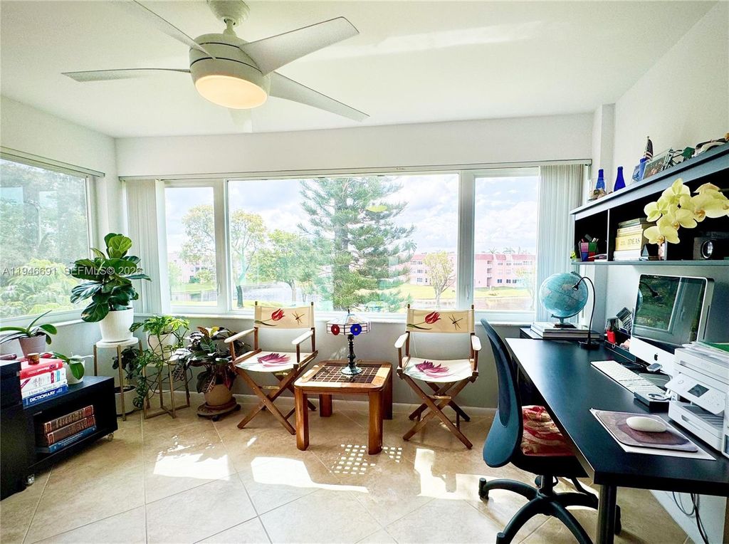 Photo of 9501 Sunrise Lakes Blvd #306, Sunrise, FL 33322 (MLS # A11946691)