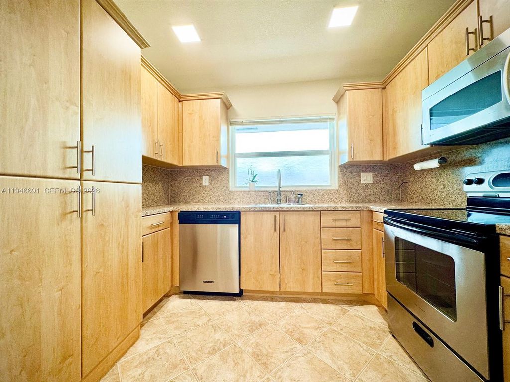 Photo of 9501 Sunrise Lakes Blvd #306, Sunrise, FL 33322 (MLS # A11946691)