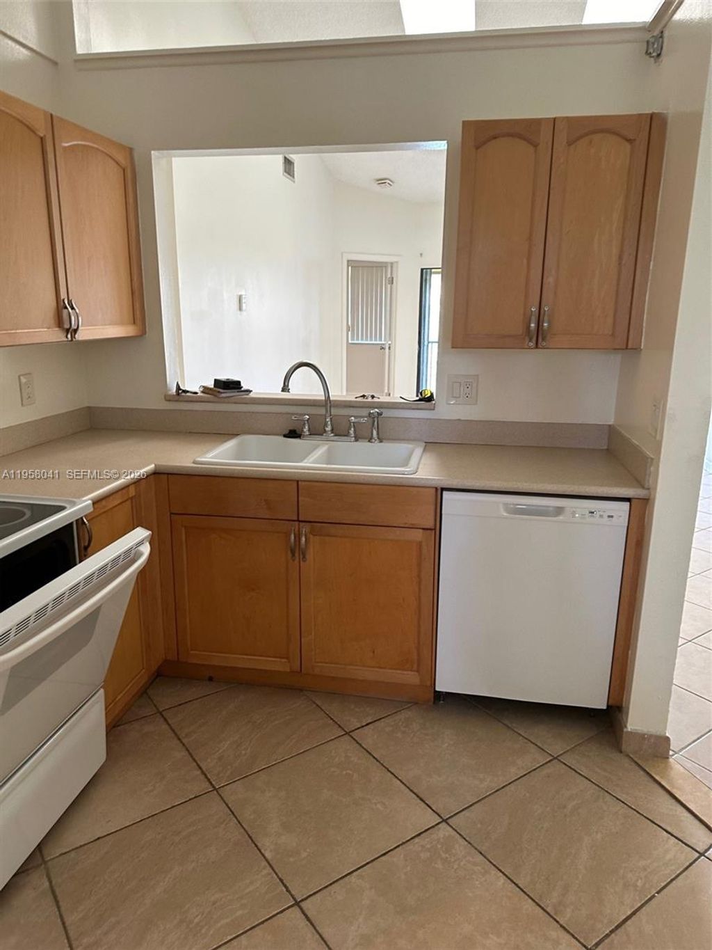 Photo of 2481 NW 56th Ave #6-16, Lauderhill, FL 33313 (MLS # A11958041)