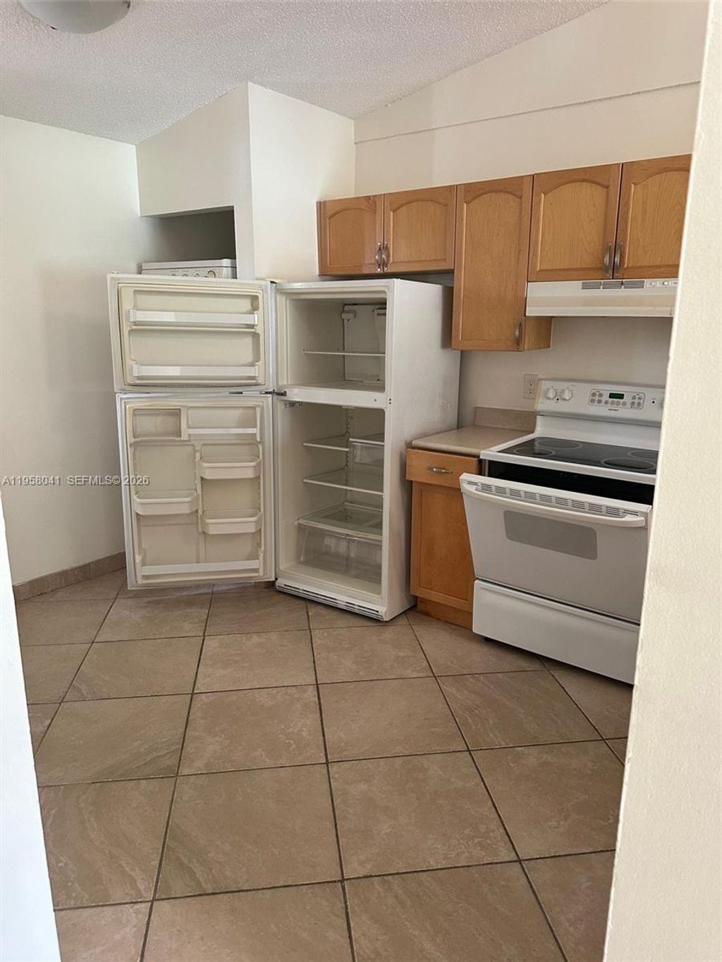 Photo of 2481 NW 56th Ave #6-16, Lauderhill, FL 33313 (MLS # A11958041)