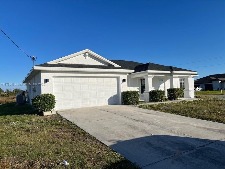 Completely remodeled 3-bed, 2 bath plus a Den home on a spacious corner lot in Lehigh Acres, Florida. Plenty of space to park boats, trailers, and trucks. The den can be used as a playroom or an office. This home features a new roof, new flooring, and stunning quartz countertops. The modern kitchen boasts stainless-steel appliances, and bathrooms are stylishly updated. Enjoy a covered terrace, a two-car garage, and the convenience of being close to shopping centers and schools. This move-in-ready offers comfort, style, and modern upgrades. Don't miss out this great opportunity. Call today to set up your private showing.