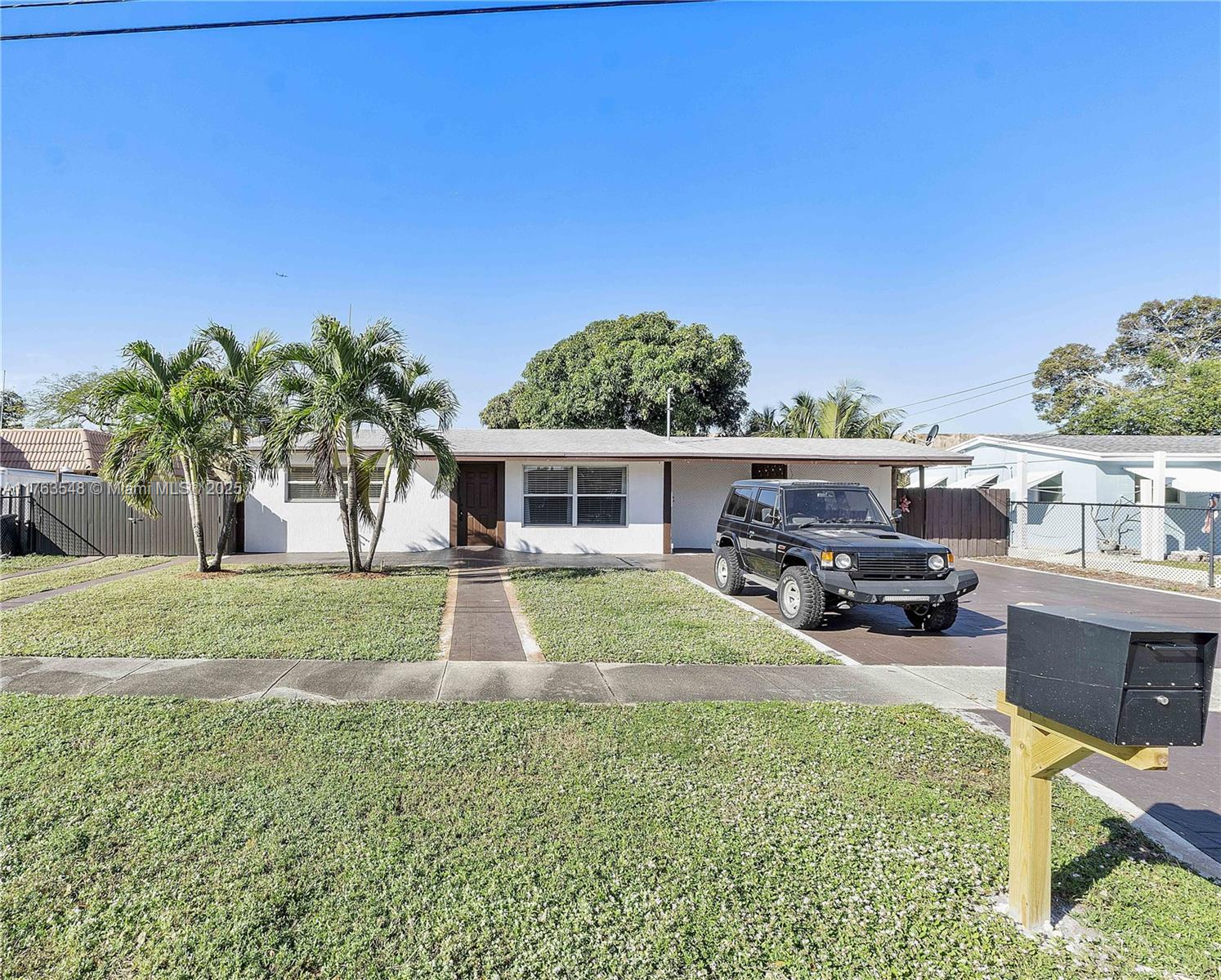 Spacious main home is 3 beds, 2 baths. Additional efficiency 1/1. Over 8,000 SF Lot offers enough space for you to build your signature pool. This single-family home sits on a quiet, dead-end street. Split floor plan. As you step into the spacious living room, you will see the open-concept design and modern kitchen to start your day with ease. Tile floors throughout make maintenance effortless,
Private fenced backyard, where summer mornings are best spent under the shade of your mango tree! No HOA ! Bring your boat, RV, or multiple cars. Great Plantation location, near lush parks, schools, shops, major highways that take you anywhere you need to go. Fort Lauderdale’s beaches, downtown, airport are all near.
This vacant, move-in-ready home is waiting for you!