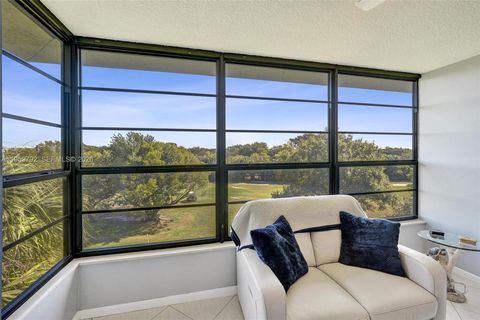 Photo of 1514 Whitehall Dr #405, Davie, FL 33324 (MLS # A11953792)