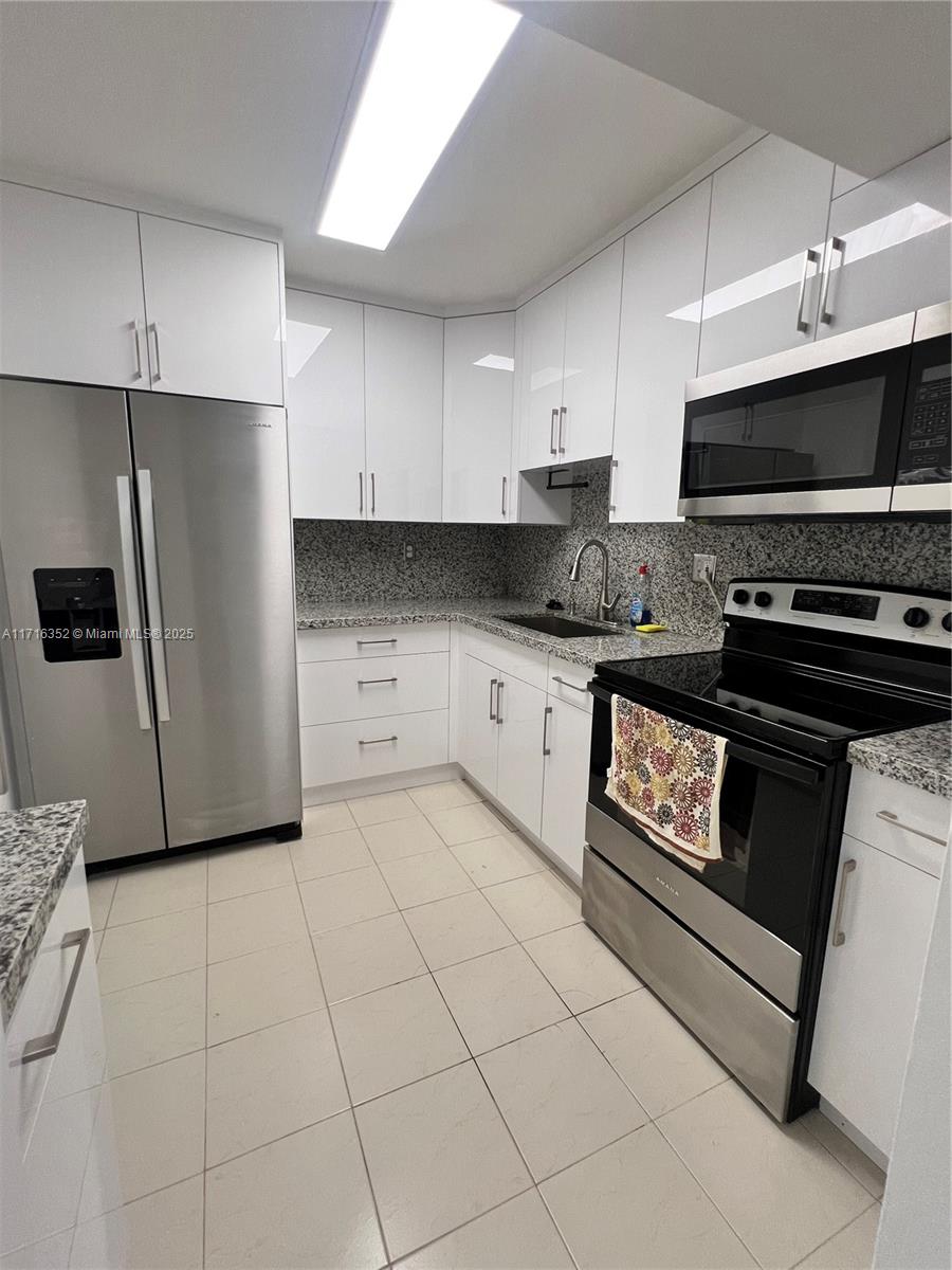 This spacious 3-bedroom, 2-bathroom apartment is a perfect blend of comfort and convenience, offering a fully remodeled kitchen with modern appliances and finishes. Situated in a highly desirable area of Miami, it’s just a short drive from Miami International Airport, making it ideal for frequent travelers. The open layout and contemporary upgrades create a welcoming atmosphere, while the location provides easy access to major highways, shopping, dining, and entertainment. Whether you’re looking for a family home or a convenient base in Miami, this apartment checks all the boxes for modern living in a prime location.