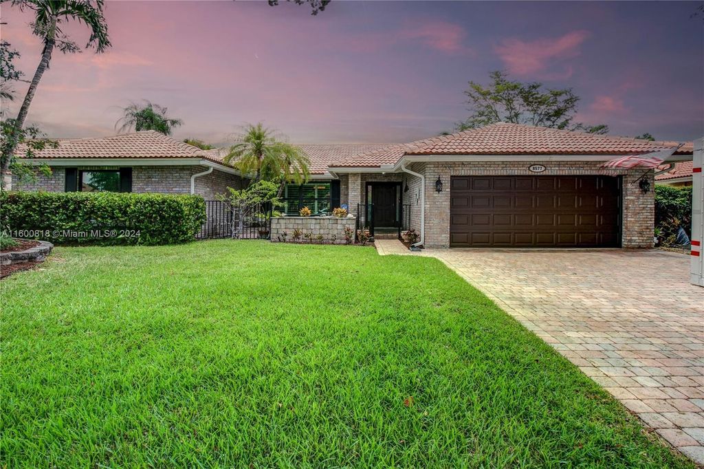 Photo of 8577 NW 51st Pl, Coral Springs, FL 33067 (MLS # A11600818)