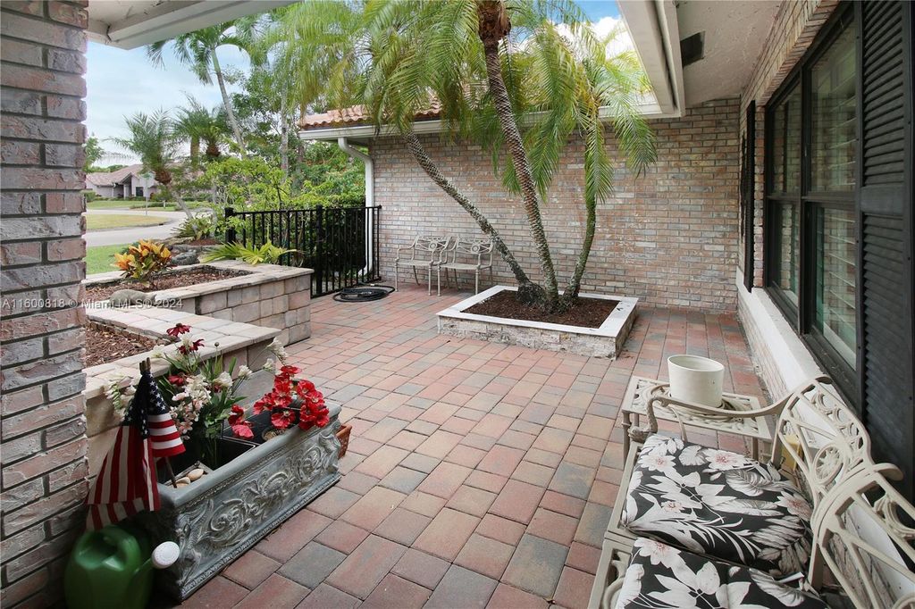 Photo of 8577 NW 51st Pl, Coral Springs, FL 33067 (MLS # A11600818)