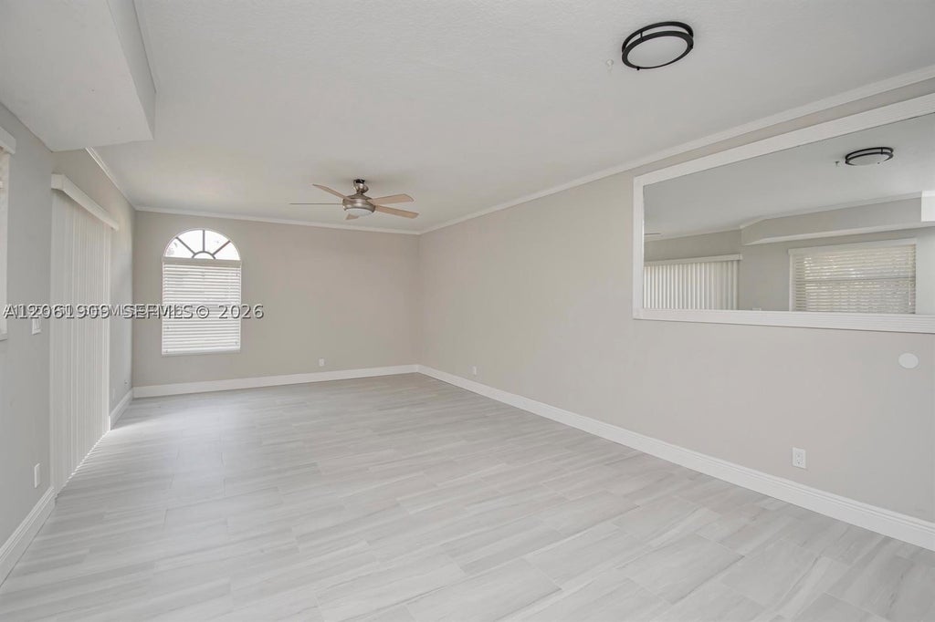 Photo of 4240 Village Dr #B, Delray Beach, FL 33445 (MLS # A12061909)