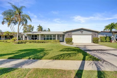 Photo of 1330 NW 122nd Ave, Pembroke Pines, FL 33026 (MLS # A12016163)