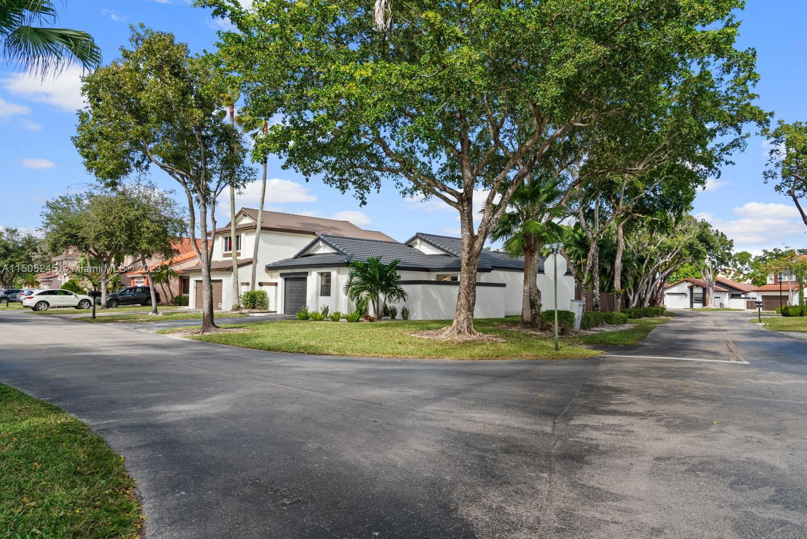 GORGEOUS FULLY RENOVATED! Beautiful & spacious 2 bedrooms + 2 full bathrooms PLUS Garage converted into 3rd room, corner home with large fenced in backyard and large screened patio! Amazing location, centrally Located in Miami Moors. Open floor plan. Washer & dryer included. Great amenities such as pool, tennis courts, fitness center. Guard gated community. Close to shopping, restaurants, highways. Basic Cable TV & internet included with Hotwire. Landscaping included.  NO HOA Approval. Rapid approval!