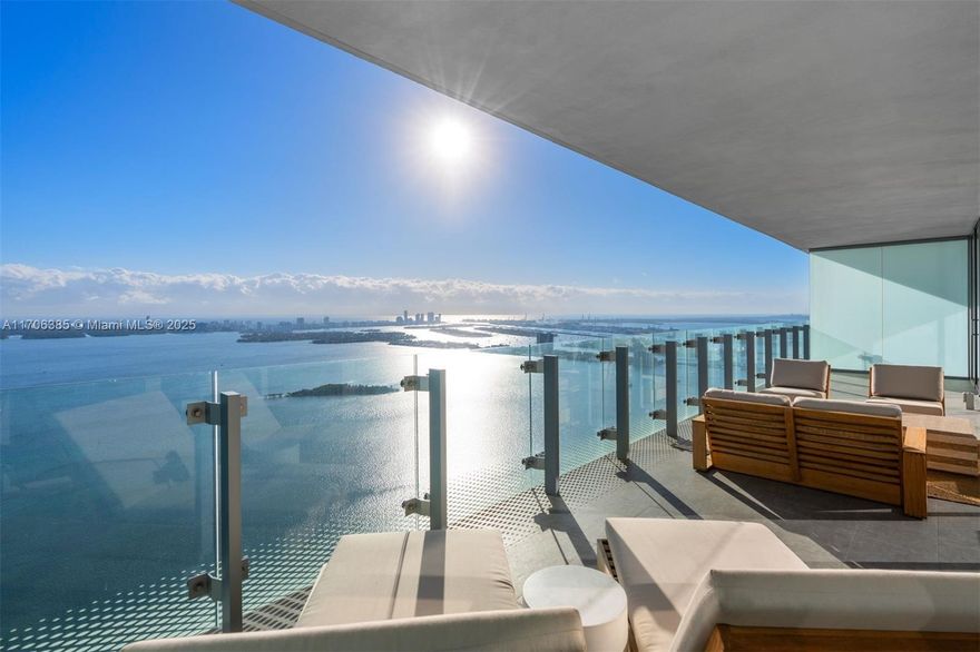 This exquisite 2-bed, 3.5-bath residence offers nearly 2,500 sq. ft. plus a den with closet and full bath, easily convertible to a 3rd bedroom (see rendering—design by VD8 Studio). Enjoy stunning east-facing Biscayne Bay views from floor-to-ceiling windows and a spacious 500 sq. ft. balcony. Features include custom Italian cabinetry, premium appliances, motorized blinds, spa-like primary bath, and custom closet. Includes 2 garage spaces. World-class amenities: infinity pool, fitness center, spa, tennis, playroom, and theater.