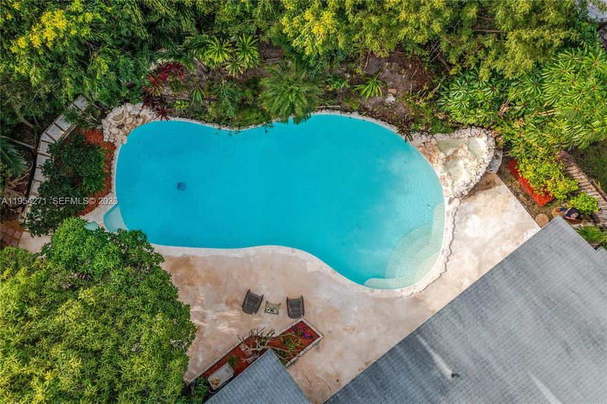 FIRST TIME ON THE MARKET; Owned by the same family for over 50 years and purchased new, this is a rare opportunity to own in the coveted lakefront community of Saga Bay.
Purposefully designed for the South Florida outdoor lifestyle, the home showcases an exceptional lagoon-style swimming pool of approximately 30,000 gallons—nearly twice the size of a typical neighborhood pool—creating a true backyard retreat. The expansive outdoor space is ideal for entertaining large gatherings of family and friends and is complemented by mature mango and carambola trees, offering year-round enjoyment and harvests.
The original double garage has been professionally converted with permits and may serve as an in-law suite or fourth bedroom, providing flexible living options to suit today’s needs.
Bring your vision and personal touch to make this home your own, and enjoy South Florida living as it was intended—outdoors. Boaters will appreciate the convenient location just two miles from Black Point Park and Marina.