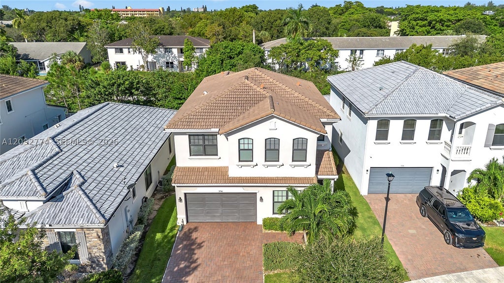 Photo of 3794 NW 89th Way, Coral Springs, FL 33065 (MLS # A12092774)