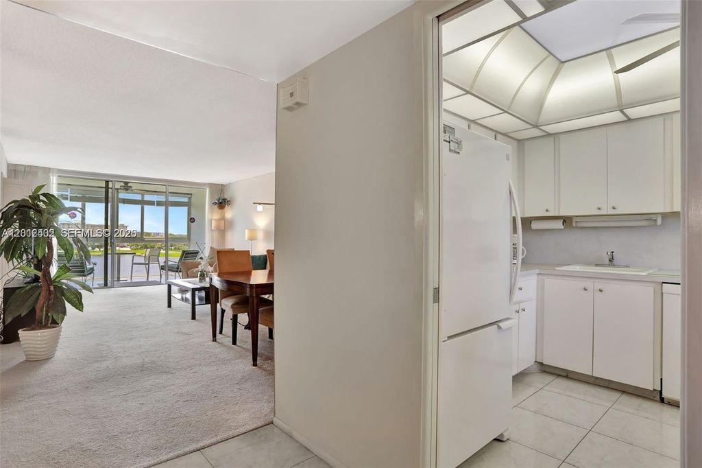 Photo of 3091 N Course Dr #502, Pompano Beach, FL 33069 (MLS # A12012402)