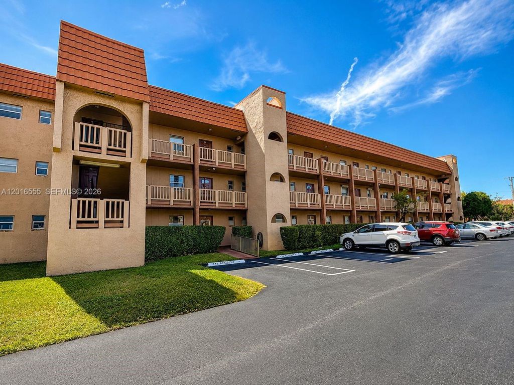 Photo of 9800 Sunrise Lakes Blvd #202, Sunrise, FL 33322 (MLS # A12016555)