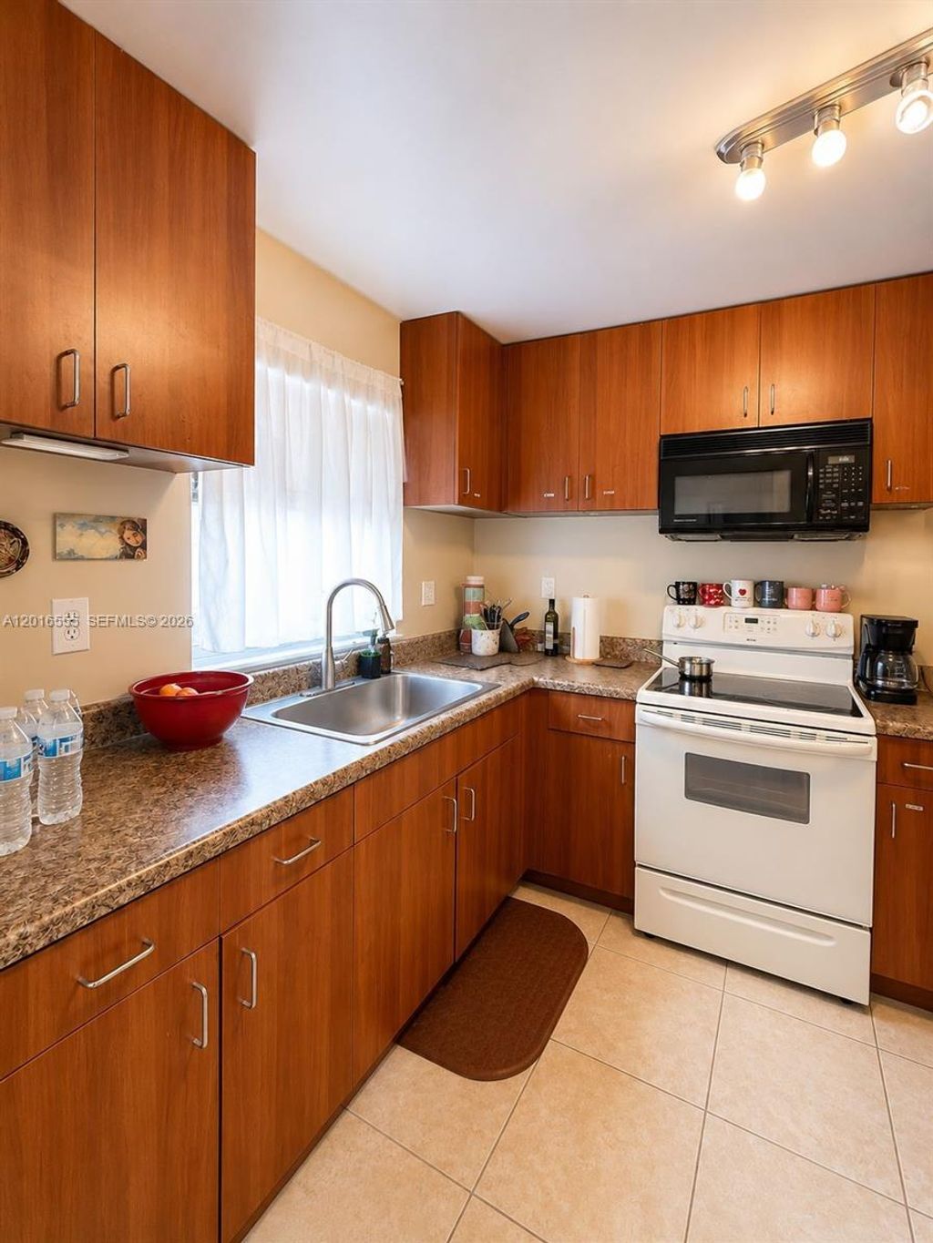 Photo of 9800 Sunrise Lakes Blvd #202, Sunrise, FL 33322 (MLS # A12016555)