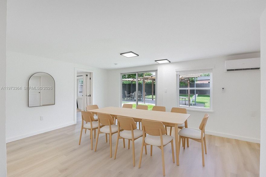 Experience life in Fort Lauderdale in this beautifully updated 4 bedroom, 3 full bathroom home! Perfect also an an investment. Located just moments from the pulse of Wilton Manors, FAT Village, and Downtown Fort Lauderdale, you'll have unparalleled access to the area's most vibrant restaurants, trendy shops, and exciting attractions. This residence is perfect for modern living, offering a refreshed interior. The fully fenced backyard is great for entertaining, featuring lush mature trees, a charming gazebo, and two shaded seating areas—the perfect retreat for quiet mornings or hosting friends. Practicality meets convenience with an oversized, paved driveway providing ample parking for multiple vehicles. Great opportunity to own a piece of central Fort Lauderdale real estate at an affordable price point. Sewer pipe relined, new roof and A/C in 2017. Don't miss your chance to live minutes from everything! Compare its size and features. Buyer concession available.