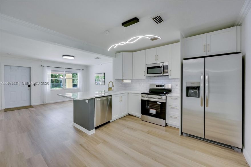 Experience life in Fort Lauderdale in this beautifully updated home