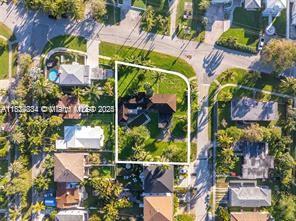 Discover a rare development opportunity in one of Miami’s most desirable waterfront corridors. This oversized corner parcel spans nearly half an acre with stunning, unobstructed views of Biscayne Bay. Zoned R-5700, the site supports multifamily development—ideal for investors, developers, or end-users seeking to capitalize on the growing demand for luxury rentals or boutique residences in North Miami. Currently improved with a two-story, 4-bedroom, 4-bathroom home (2,894 sq ft) featuring a pool and bay-facing exposure, the property is best suited for redevelopment. Waterfront Lot with sweeping bay views and direct access potential, Multifamily Zoning (R-5700) – Build duplexes or explore custom configurations. Corner Lot Exposure for enhanced privacy, access, and layout flexibility.