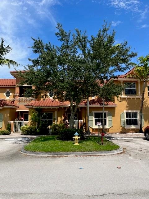 Beautifully appointed Pembroke Pines 2 + Den/2.5 baths villa in the highly desirable gated community of Pembroke Cay. This beautiful home has been fully renovated, new floors and paint and has been impeccably kept. It is move in ready! Enjoy the open floor plan concept with gorgeous private water views, and no rear neighbors. The bedrooms are spacious with large closets and bathrooms inside. The high ceilings and oversized windows allow the natural sunlight to flood the interior. The community offers a beautiful pool and playground area. The home is conveniently located right across from the Shops at Pembroke Gardens Mall (shopping and dining paradise...), and within minutes from major highways. The home has one designated parking spot and plenty of guest parking for visitors
