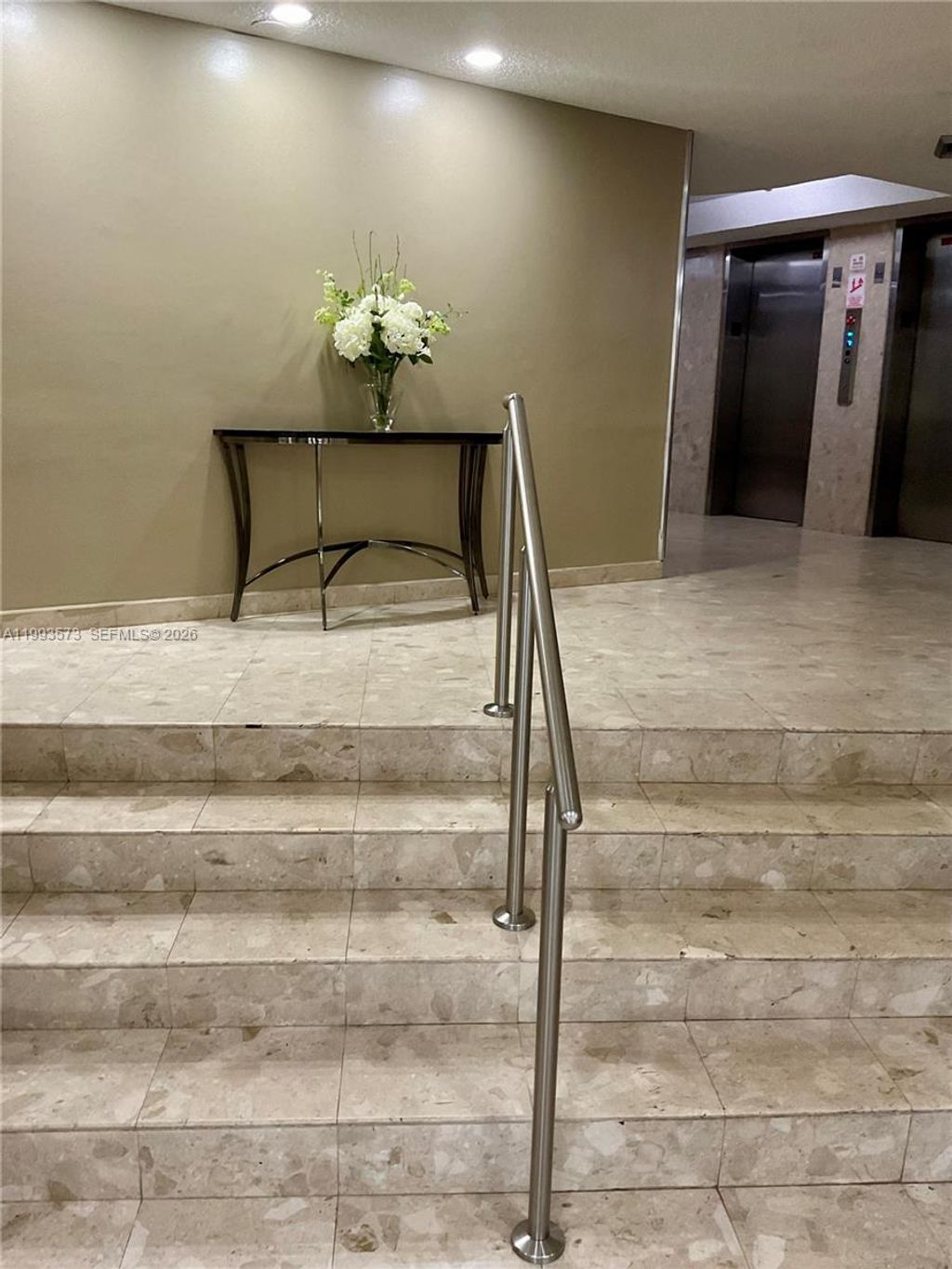 Photo of 100 Golden Isles Dr #814, Hallandale Beach, FL 33009 (MLS # A11993573)